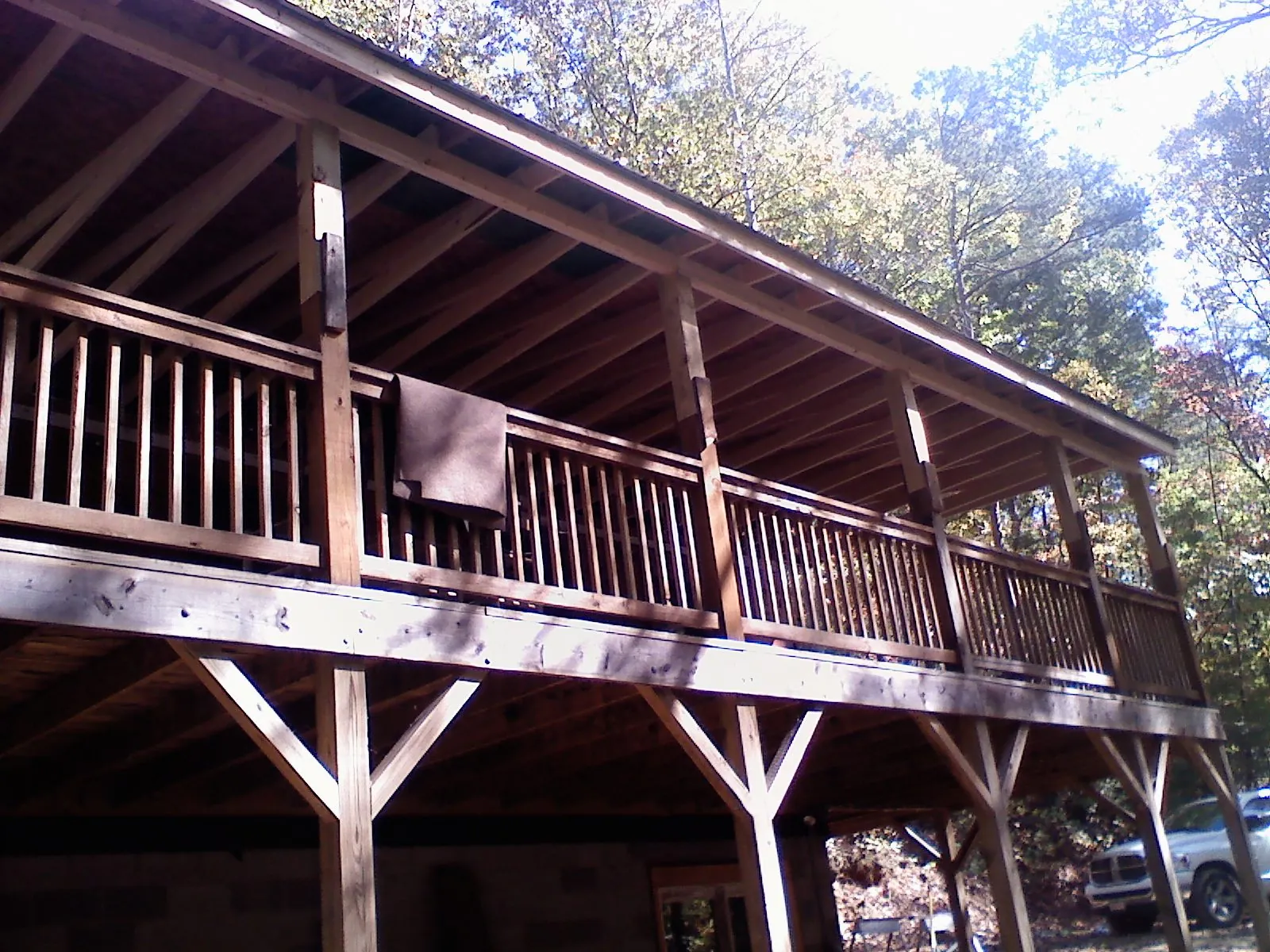 Timber framing under a new elevated porch and deck — Roof Leak Repair in Sharpsburg by Roofing Brothers